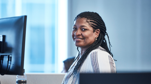 A smiling office worker.